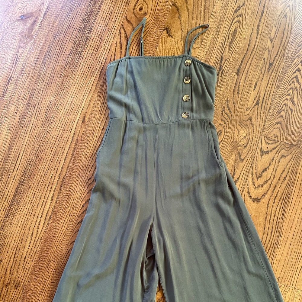 Xhiliration olive green spaghetti strap wide legged cropped leg jump suit